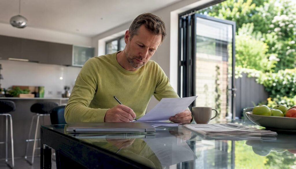 UK homeowner reviewing EV charger installation quotes